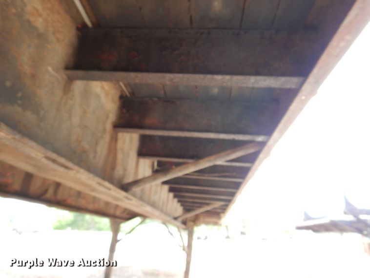 image for item IQ9525 1975 Delta  flatbed trailer