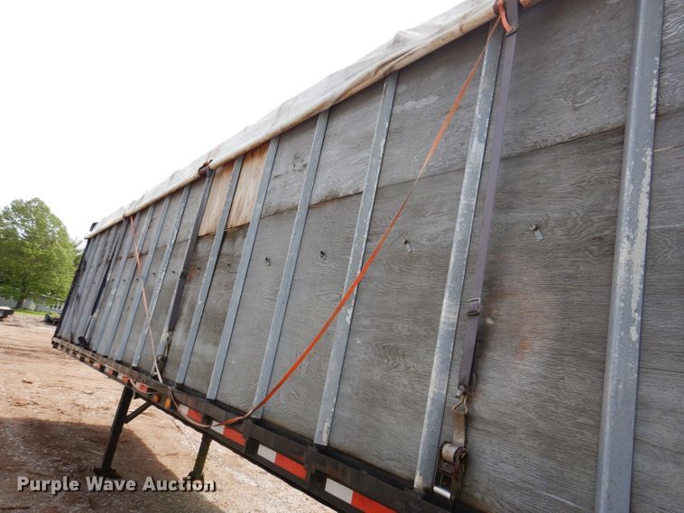 image for item IQ9525 1975 Delta  flatbed trailer