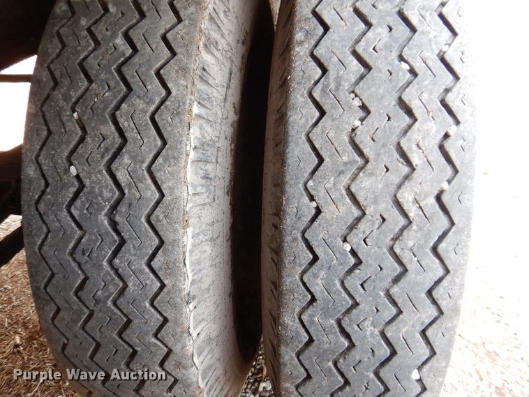 image for item IQ9525 1975 Delta  flatbed trailer