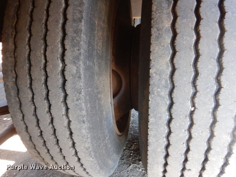 image for item IQ9552 1996 Fontaine  lowboy equipment trailer