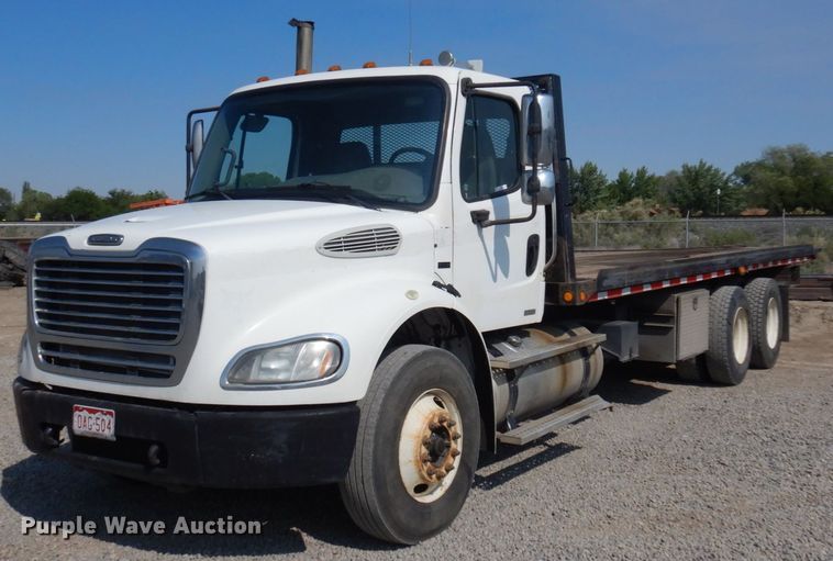 image for item KA9000 2005 Freightliner Business Class M2  rollback truck