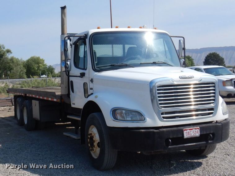 image for item KA9000 2005 Freightliner Business Class M2  rollback truck