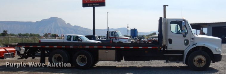 image for item KA9000 2005 Freightliner Business Class M2  rollback truck