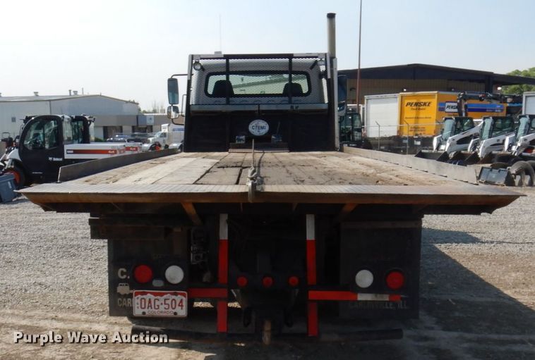 image for item KA9000 2005 Freightliner Business Class M2  rollback truck