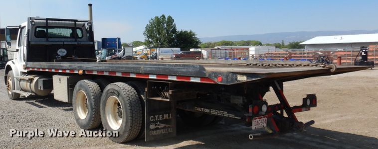 image for item KA9000 2005 Freightliner Business Class M2  rollback truck