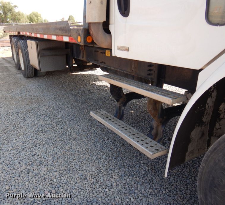 image for item KA9000 2005 Freightliner Business Class M2  rollback truck