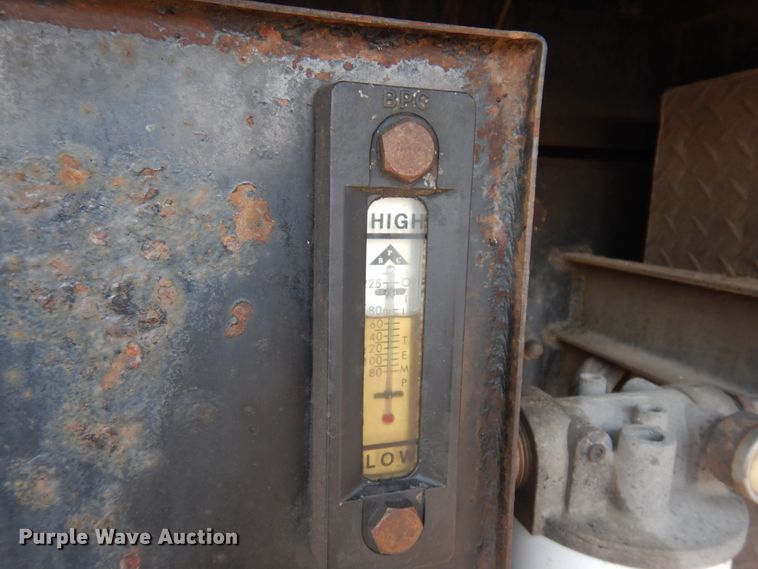 image for item KA9000 2005 Freightliner Business Class M2  rollback truck