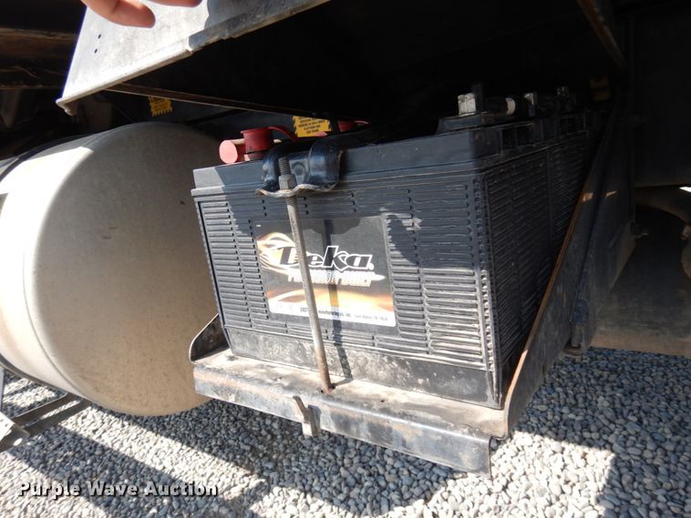 image for item KA9000 2005 Freightliner Business Class M2  rollback truck