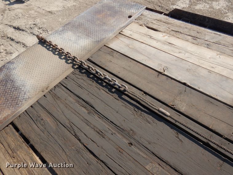 image for item KA9000 2005 Freightliner Business Class M2  rollback truck