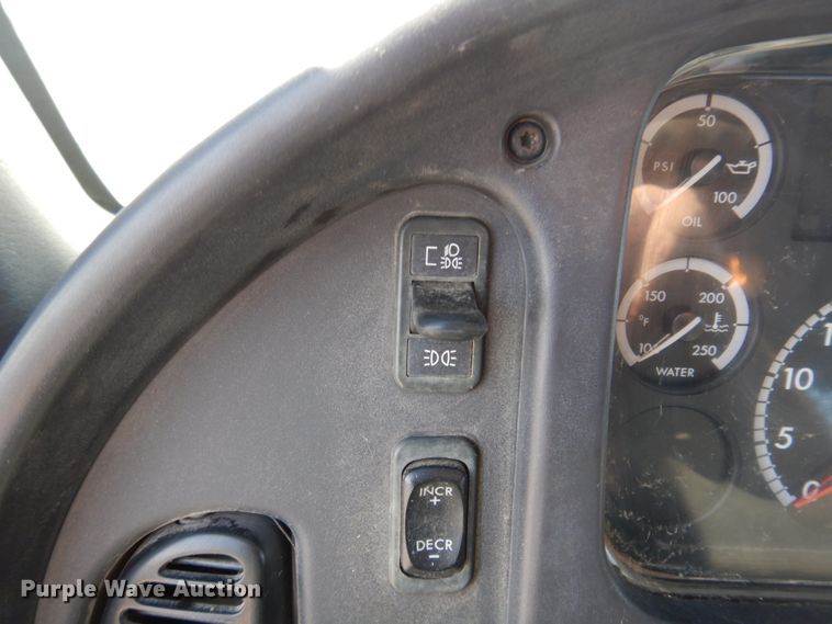 image for item KA9000 2005 Freightliner Business Class M2  rollback truck