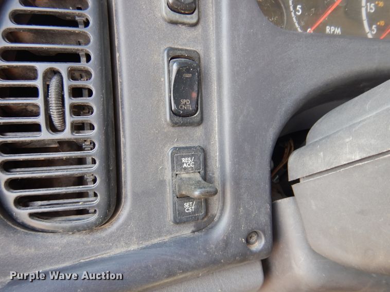 image for item KA9000 2005 Freightliner Business Class M2  rollback truck