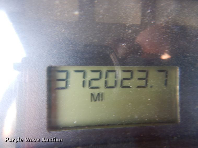 image for item KA9000 2005 Freightliner Business Class M2  rollback truck