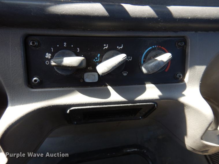 image for item KA9000 2005 Freightliner Business Class M2  rollback truck