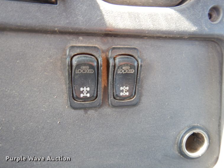 image for item KA9000 2005 Freightliner Business Class M2  rollback truck