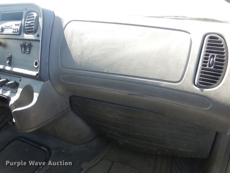 image for item KA9000 2005 Freightliner Business Class M2  rollback truck