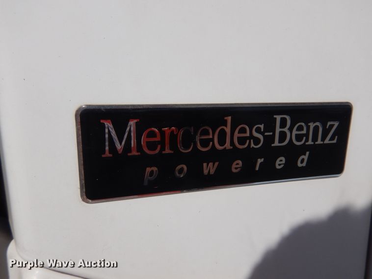 image for item KA9000 2005 Freightliner Business Class M2  rollback truck