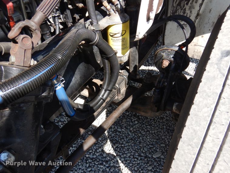 image for item KA9000 2005 Freightliner Business Class M2  rollback truck