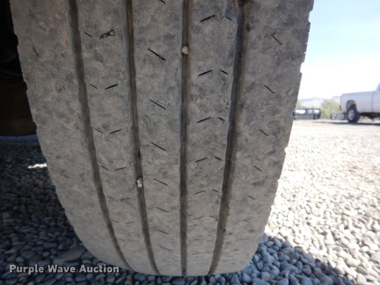 image for item KA9000 2005 Freightliner Business Class M2  rollback truck