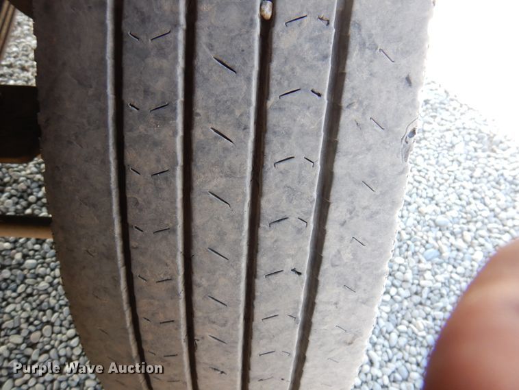 image for item KA9000 2005 Freightliner Business Class M2  rollback truck