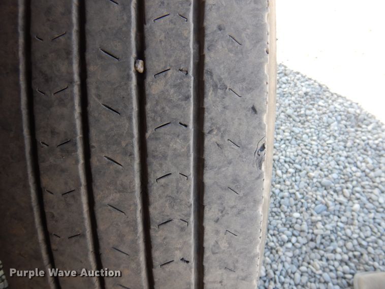 image for item KA9000 2005 Freightliner Business Class M2  rollback truck