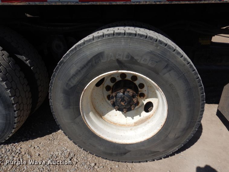 image for item KA9000 2005 Freightliner Business Class M2  rollback truck