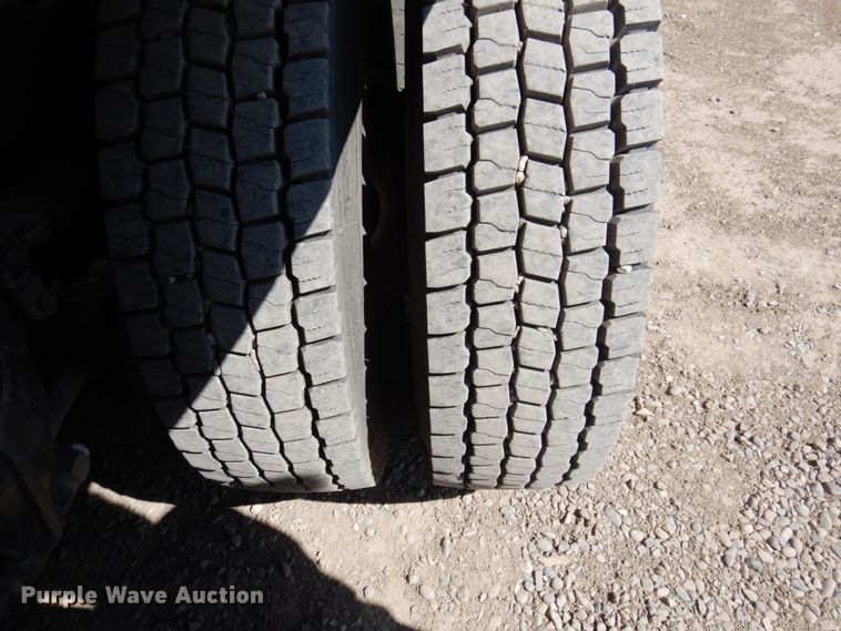 image for item KA9000 2005 Freightliner Business Class M2  rollback truck