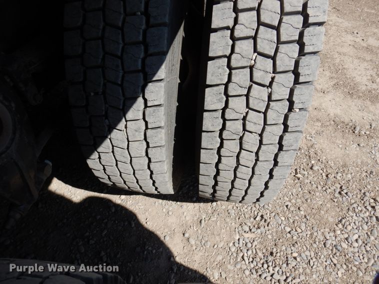 image for item KA9000 2005 Freightliner Business Class M2  rollback truck