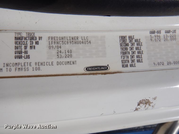 image for item KA9000 2005 Freightliner Business Class M2  rollback truck