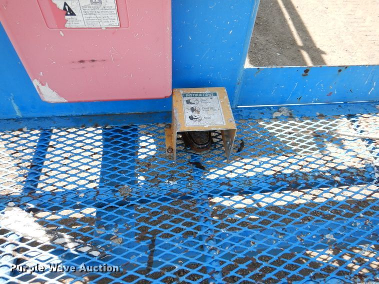 image for item IQ9558 2003 Genie Z-80/60  boom lift