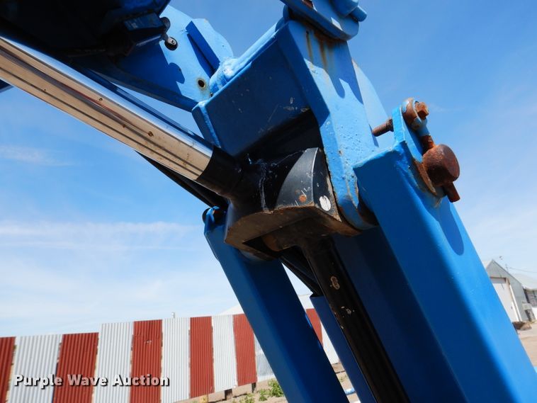 image for item IQ9558 2003 Genie Z-80/60  boom lift