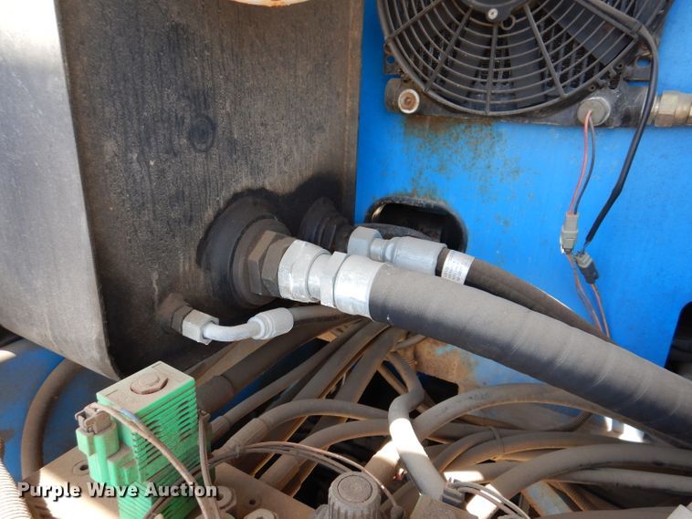 image for item IQ9558 2003 Genie Z-80/60  boom lift