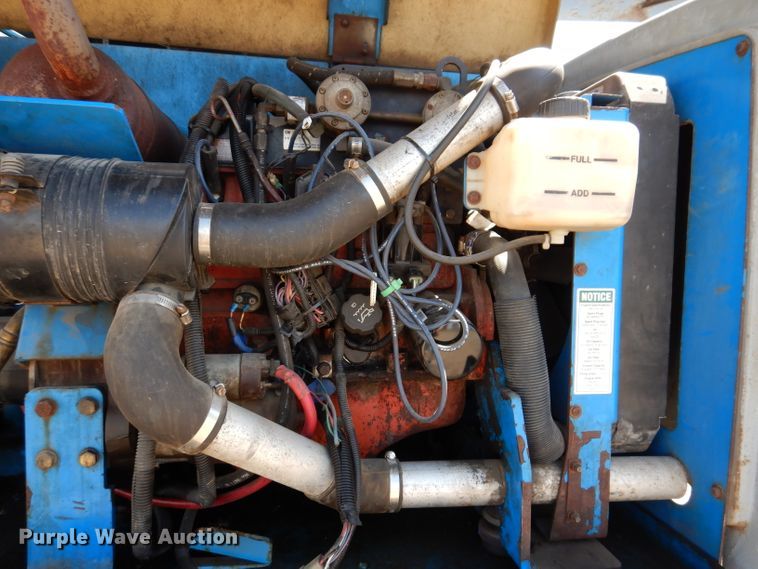 image for item IQ9558 2003 Genie Z-80/60  boom lift