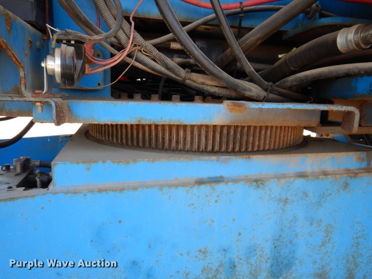 image for item IQ9558 2003 Genie Z-80/60  boom lift