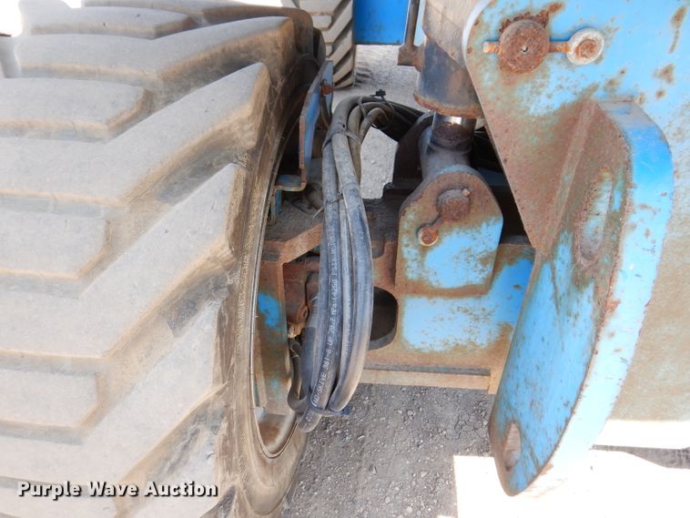 image for item IQ9558 2003 Genie Z-80/60  boom lift