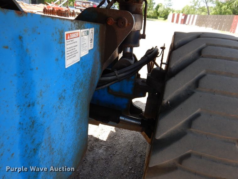 image for item IQ9558 2003 Genie Z-80/60  boom lift