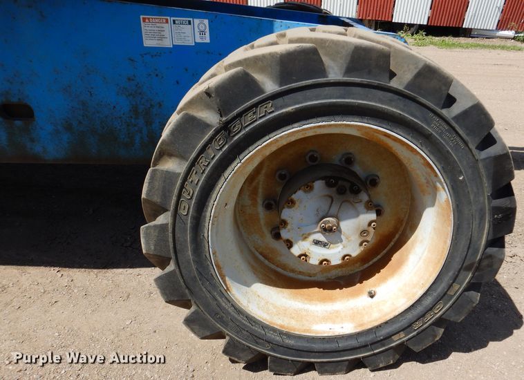 image for item IQ9558 2003 Genie Z-80/60  boom lift