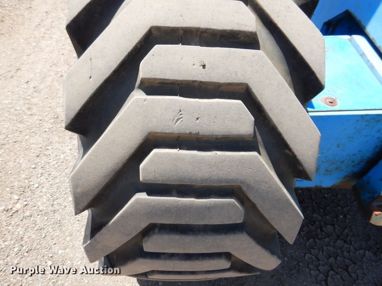 image for item IQ9558 2003 Genie Z-80/60  boom lift