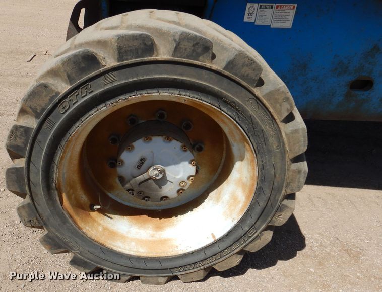 image for item IQ9558 2003 Genie Z-80/60  boom lift