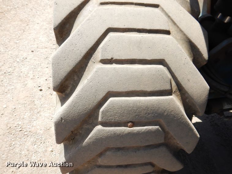 image for item IQ9558 2003 Genie Z-80/60  boom lift