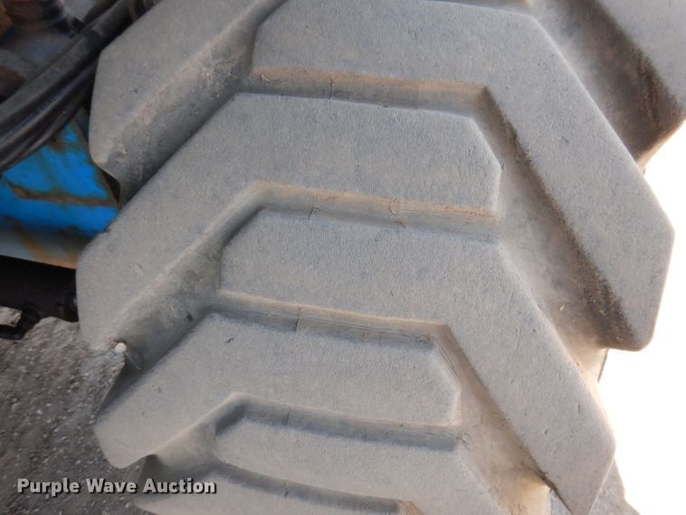 image for item IQ9558 2003 Genie Z-80/60  boom lift