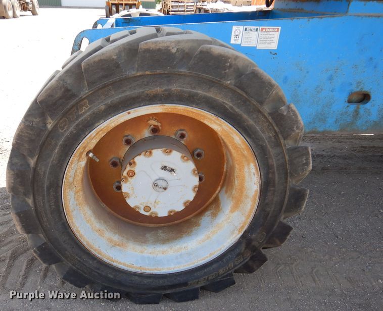 image for item IQ9558 2003 Genie Z-80/60  boom lift