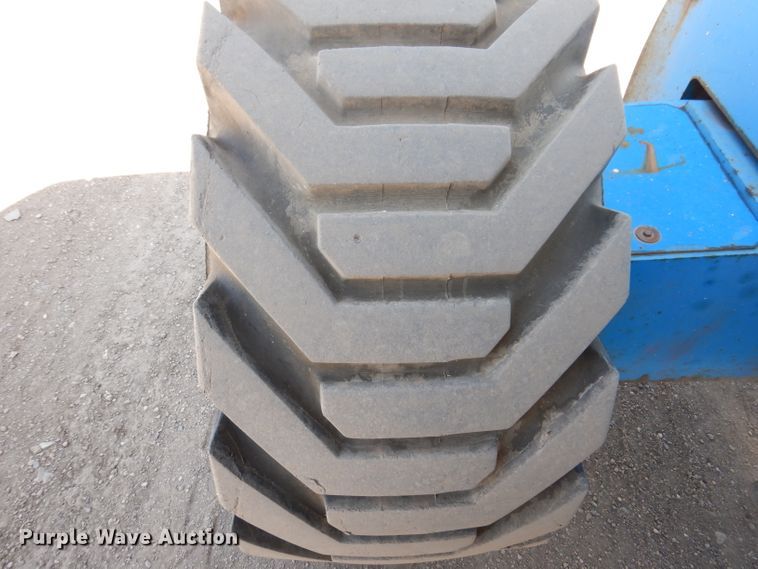 image for item IQ9558 2003 Genie Z-80/60  boom lift