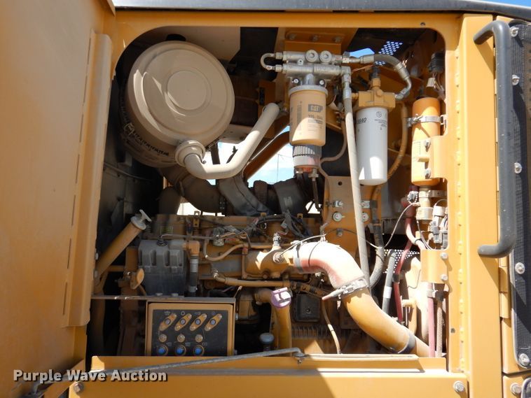 image for item IQ9602 2010 Caterpillar 140M  VHP motor grader