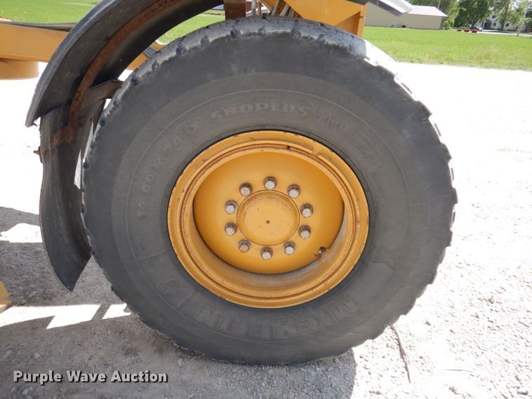 image for item IQ9602 2010 Caterpillar 140M  VHP motor grader