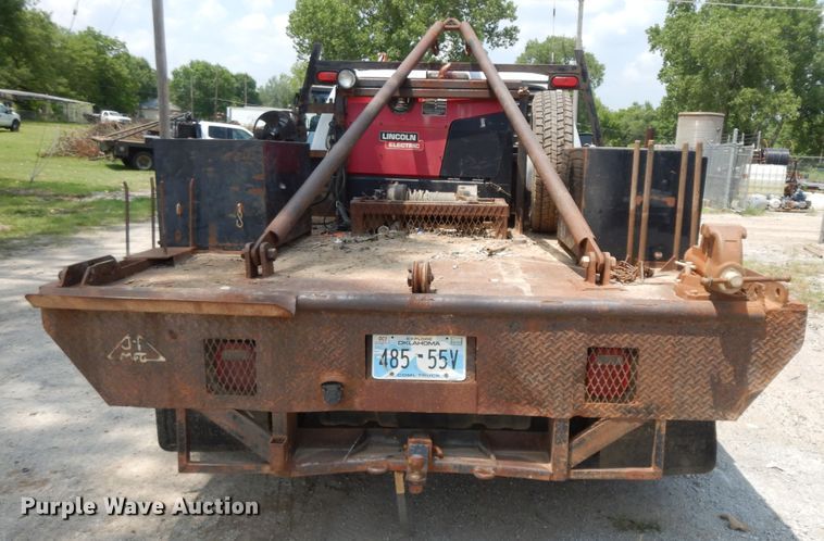 image for item HP9575 2012 Ford F550  SuperCab flatbed truck