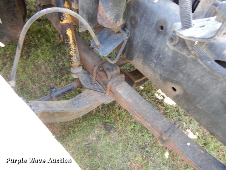 image for item HP9580 1999 International 4700  flatbed truck