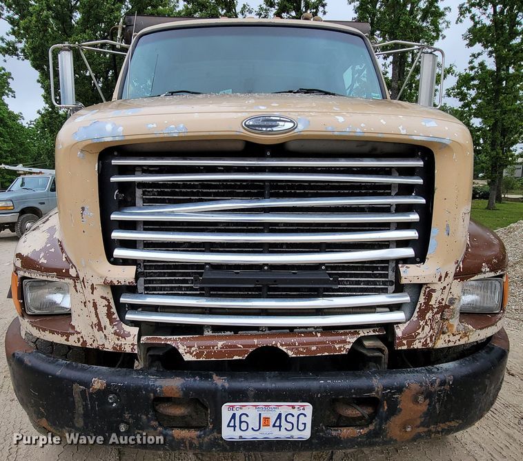 image for item IF9843 1999 Sterling A9500  roll-off container truck