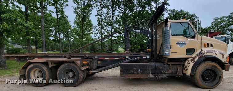 image for item IF9843 1999 Sterling A9500  roll-off container truck