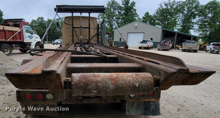 image for item IF9843 1999 Sterling A9500  roll-off container truck