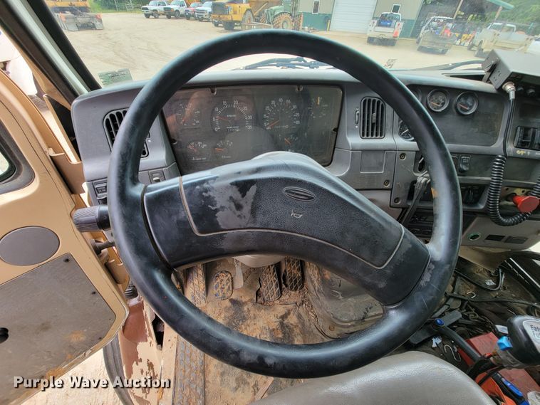 image for item IF9843 1999 Sterling A9500  roll-off container truck